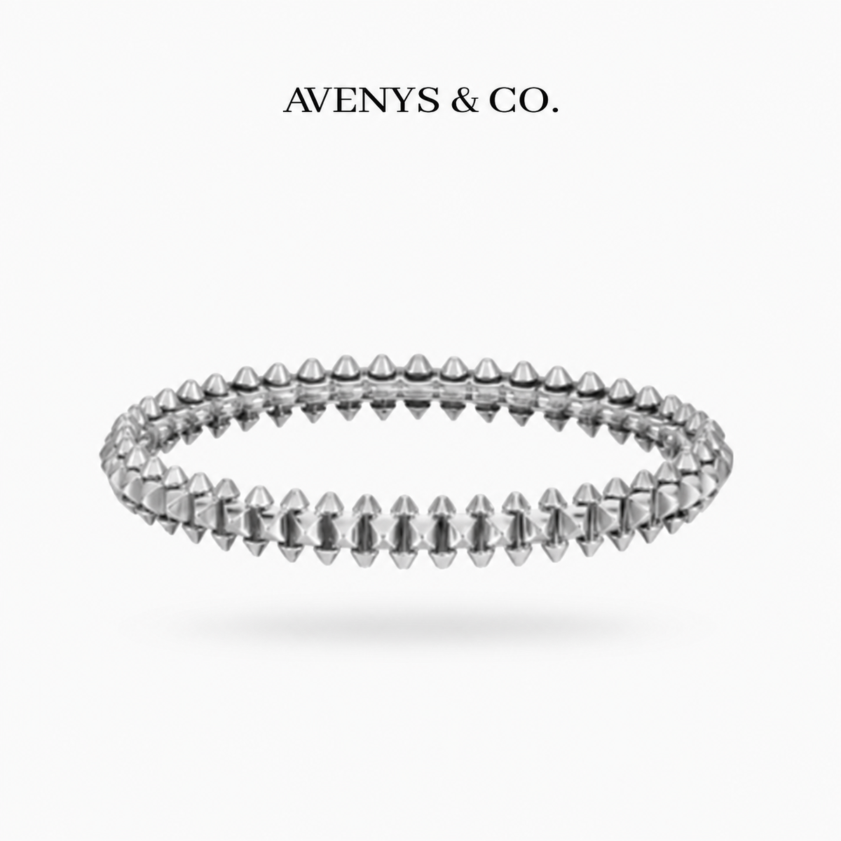 AVENYS & CO. Rivet Bangle on White Gold, 17cm, with a plain studded metal pattern and no stones.