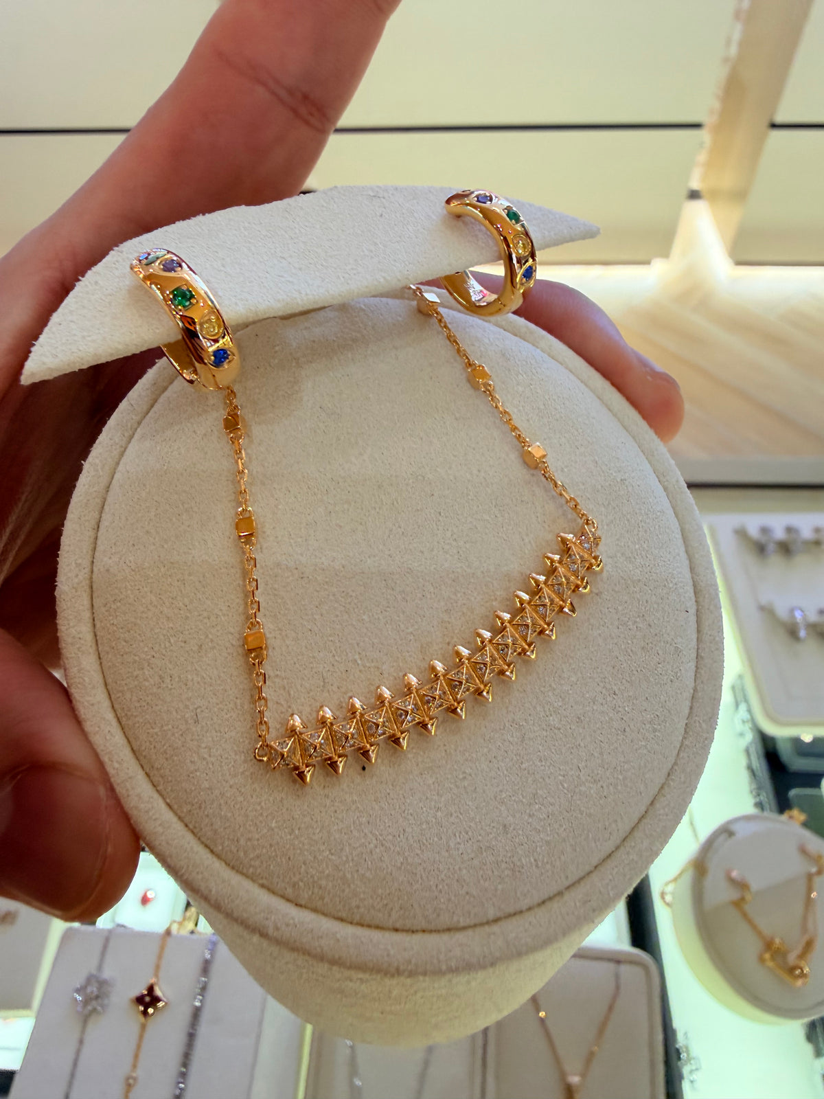 Original reference photo — Pyramid Link Collar Necklace on Yellow Gold; other jewellery visible is not included