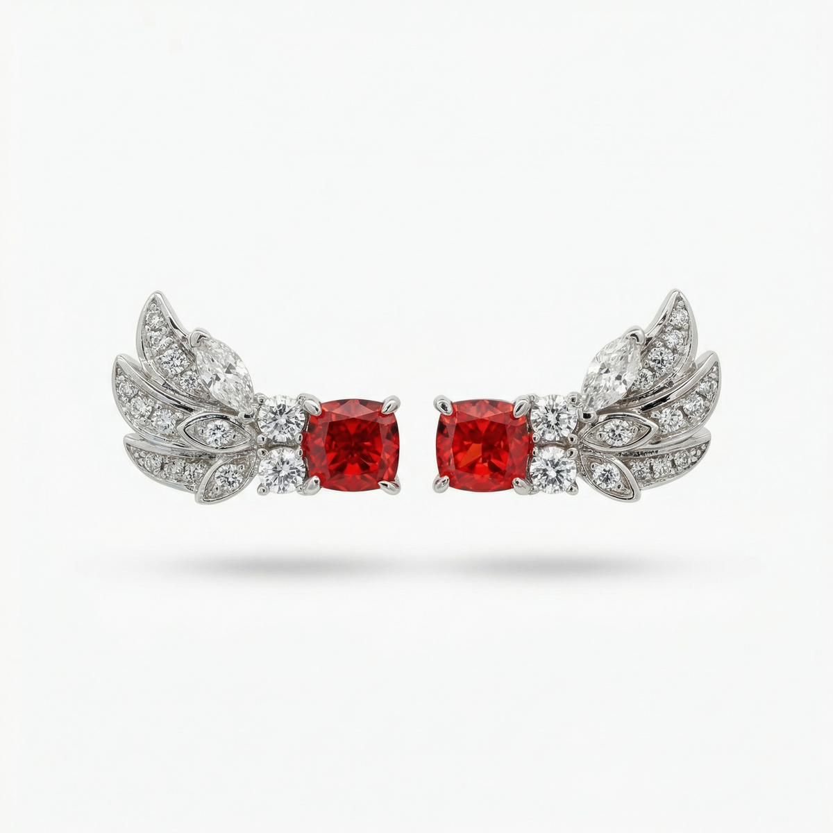 Red Wings Earrings with Red Cushion Stone – on White Gold