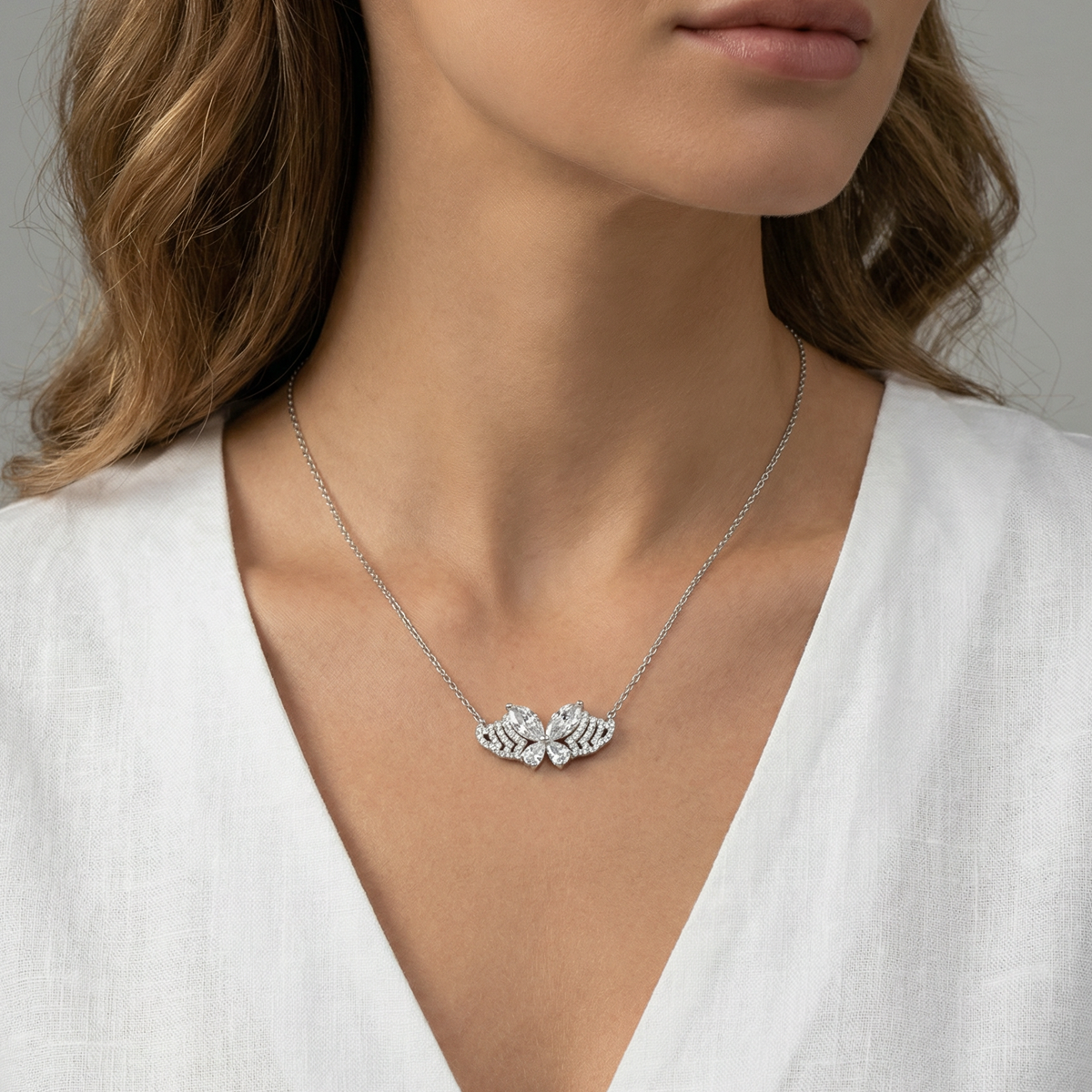 White Gold Plated Silver Butterfly Charm Necklace with Pear Cut Diamonds